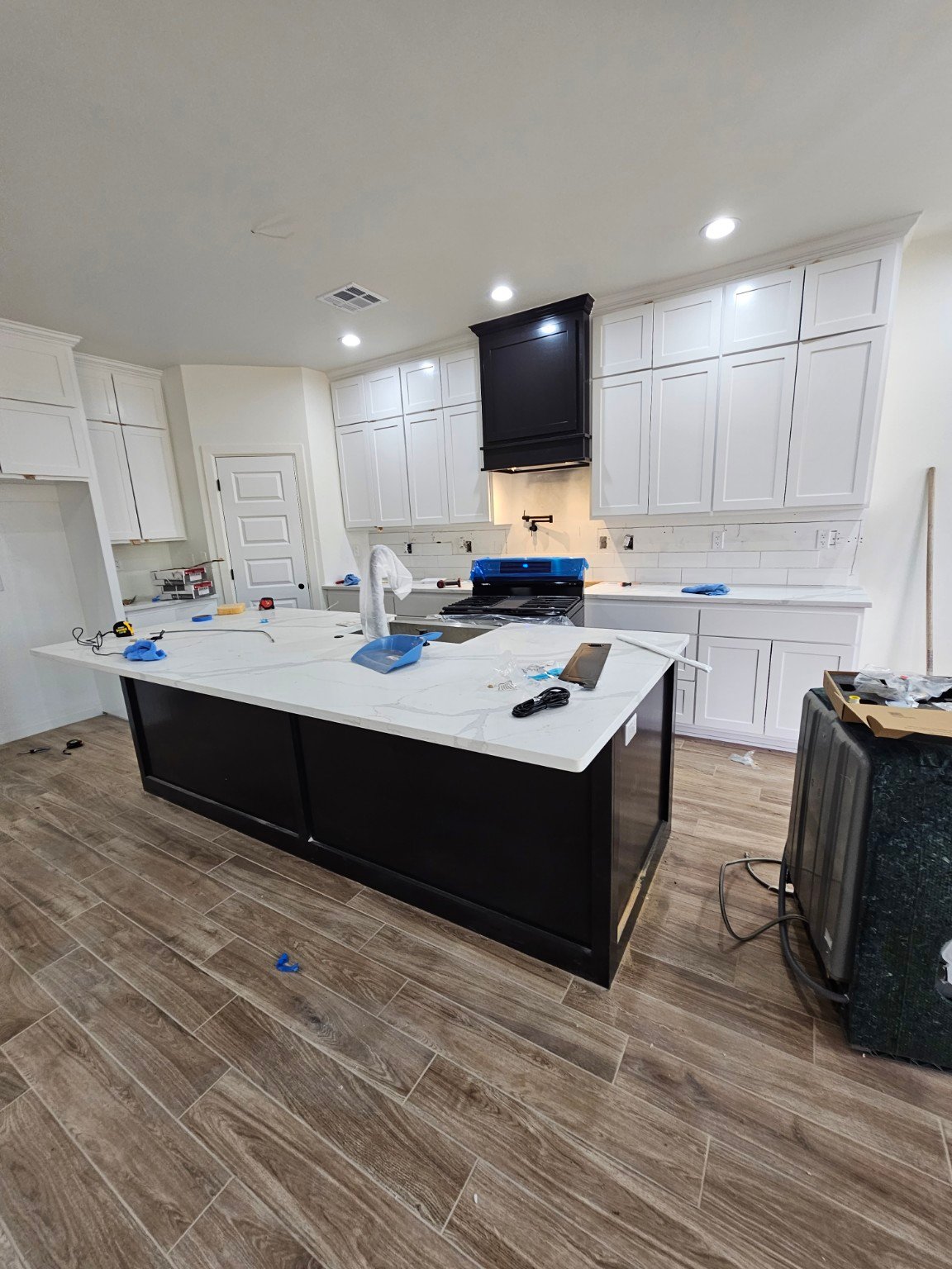 Kitchen installation at 2229 NW 34 ground-up construction project in Oklahoma City