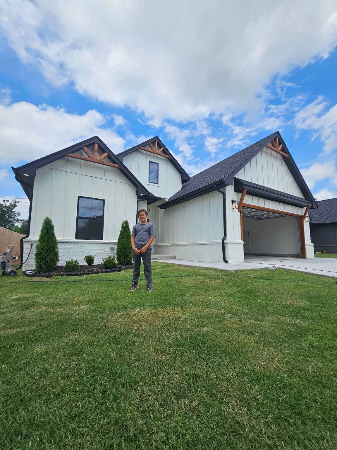 Completed white exterior at 2229 NW 34 ground-up construction project in Oklahoma City